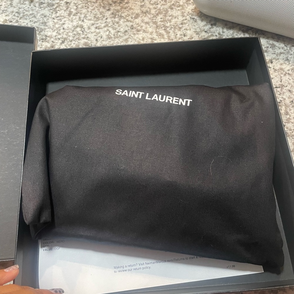 Never worn and brand new! This guy bought it 4 me, I told him I dont want it